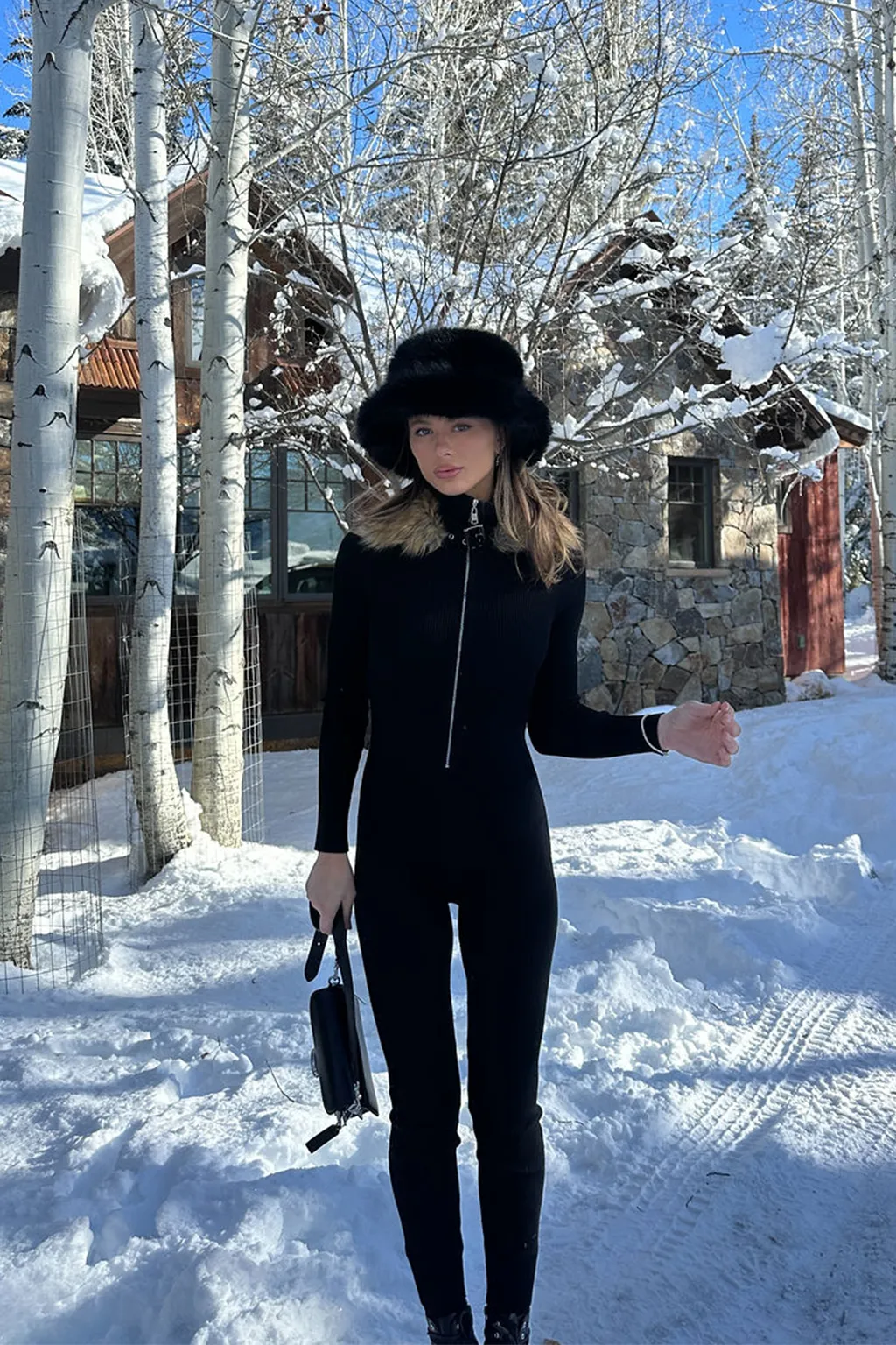 Apres Faux Fur Trimmed Black Ribbed Knit Jumpsuit